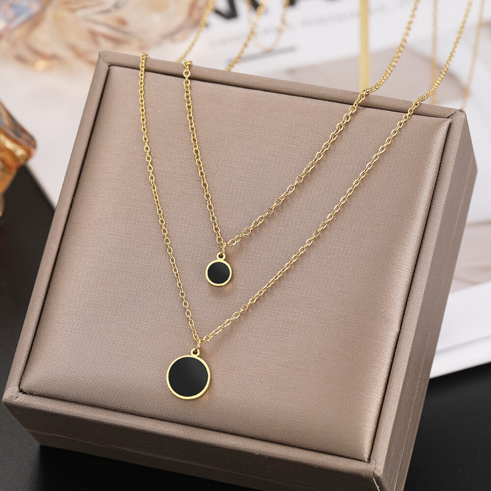 Radiant Elegance: Gold Round Charm Double Layered Necklace Set